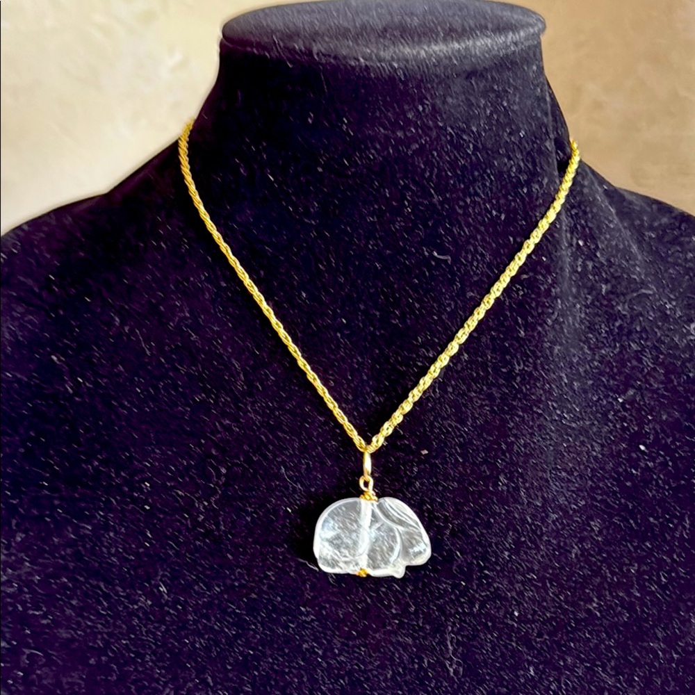 Gold tone chain with clear rock quartz crystal carved rabbit Pendant
